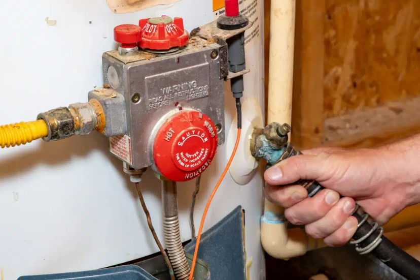 close up of water heater gauges